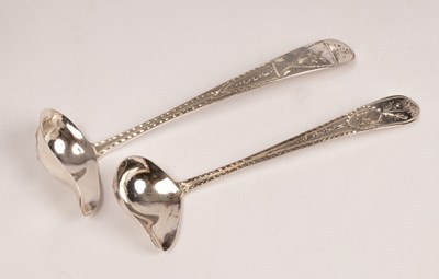 Lot 147 - Two Irish silver sauce ladles, John Power,...