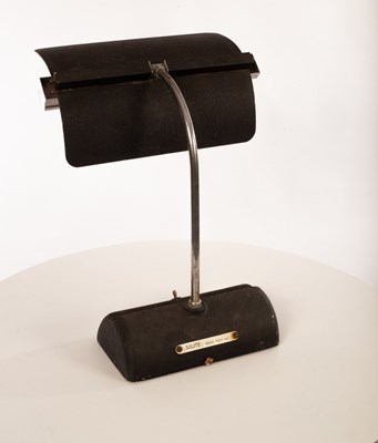 Lot 46 - A metal desk lamp, the textured aluminium...