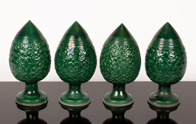 Lot 160 - Four green glazed pottery trees, each 35cm high