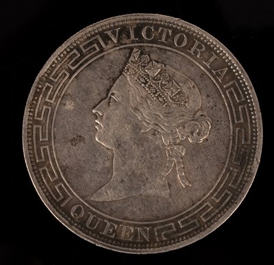 Lot 504 - A Hong Kong silver coin with '1866, One Dollar'...