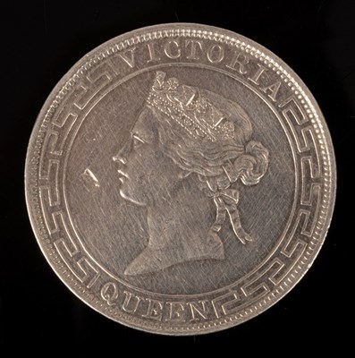 Lot 505 - A Hong Kong silver coin with '1868, One Dollar'...