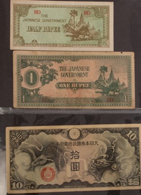 Lot 509 - A album of world bank notes to include Chinese,...