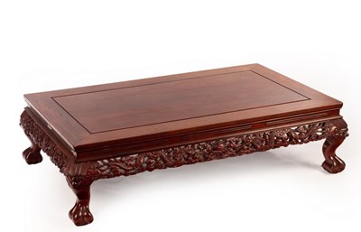 Lot 555 - A Chinese mahogany coffee table, 20th Century,...