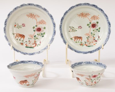 Lot 577 - A pair of Chinese famille rose teacups and...