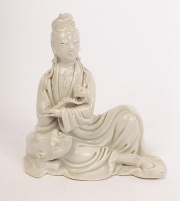 Lot 604 - A Chinese Dehua kiln porcelain Guanyin figure,...