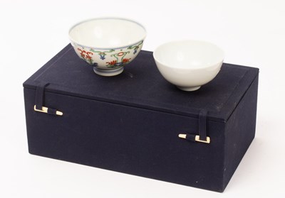 Lot 609 - Two Chinese porcelain cups, 20th Century, the...