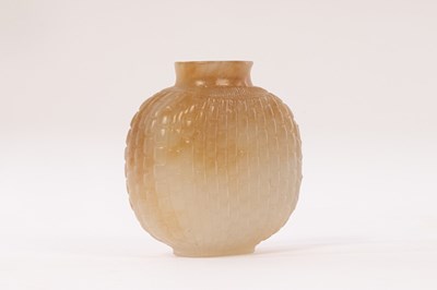 Lot 625 - A Chinese white jade carved snuff bottle, 20th...