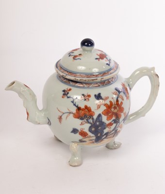 Lot 637 - A Chinese Imari tripod globular teapot and...