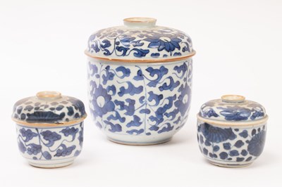 Lot 655 - A blue and white jar and cover and two similar...