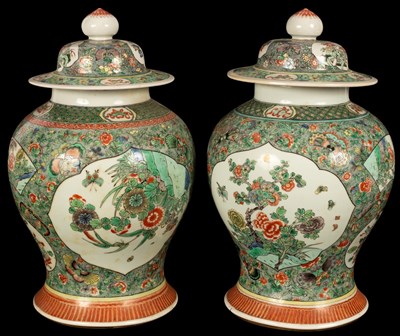 Lot 667 - A pair of Chinese famille baluster vases...