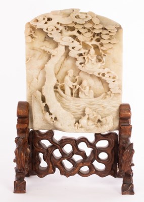 Lot 680 - A Chinese carved soapstone table screen, on...