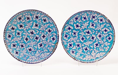 Lot 683 - A pair of Iznik style pottery chargers, 19th...