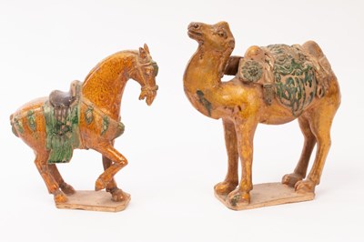 Lot 684 - Two Chinese Tangsancai terracotta animals, one...