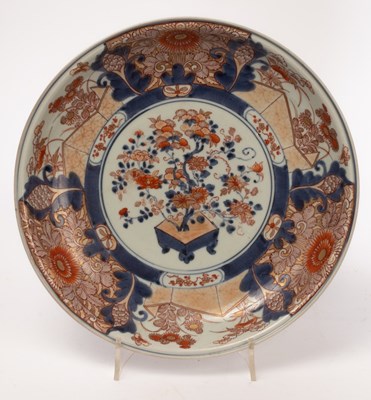 Lot 691 - A Chinese Imari style porcelain charger, iron...