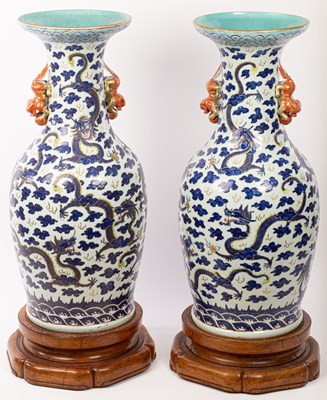 Lot 700 - A large pair of Chinese famille rose porcelain...