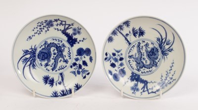 Lot 711 - A pair of Chinese blue and white plates,...