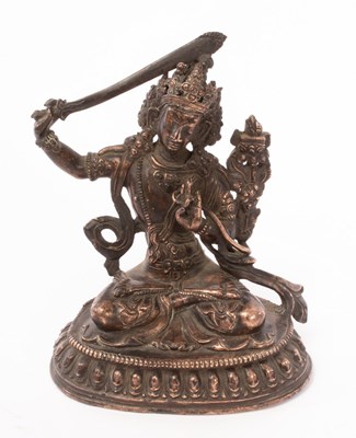 Lot 713 - A Chinese brass figure of Bodhisattva, Qing,...