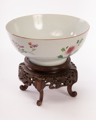 Lot 730 - A Chinese export punch bowl on a wooden stand,...