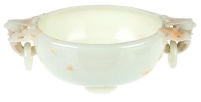 Lot 265 - A fine white jade 'Phoenix' marriage bowl,...