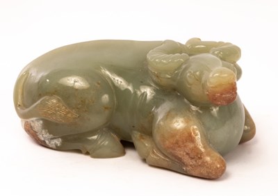 Lot 756 - A Chinese celadon jade recumbent buffalo,...