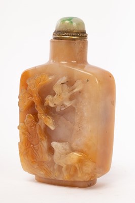 Lot 773 - A Chinese jade carved snuff bottle, Qing...