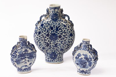 Lot 795 - Three Chinese blue and white porcelain moon...