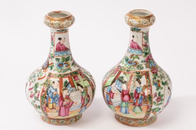 Lot 797 - A pair of Chinese export famille rose vases,...