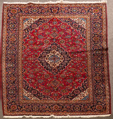 Lot 858 - A Kashan carpet, central Persia, the madder...