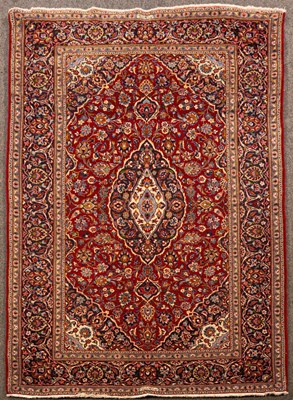 Lot 859 - A Kashan rug, Central Persia, the plum red...