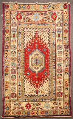 Lot 867 - A Rabat rug, Morocco, the cherry red field...