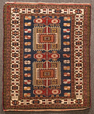 Lot 882 - A Shirvan rug, the cobalt blue field of...