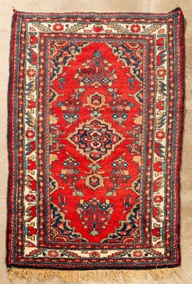 Lot 899 - A Hamadan rug, West Persia, the strawberry...