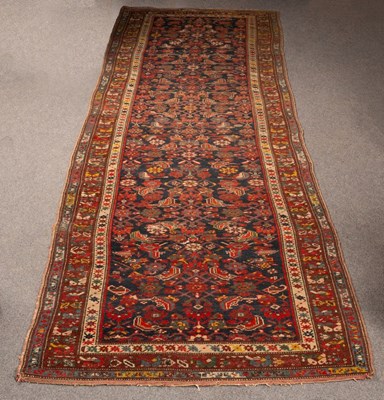 Lot 909 - A North West Persian runner, circa 1900, the...