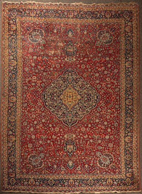 Lot 916 - A Tabriz carpet, North West Persia, the madder...