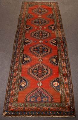 Lot 917 - A Hamadan runner, West Persia, the madder...