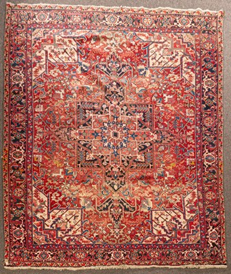 Lot 929 - A Heriz carpet, North-West Persia, with a...