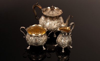 Lot 1 - A late Victorian three-piece silver tea...