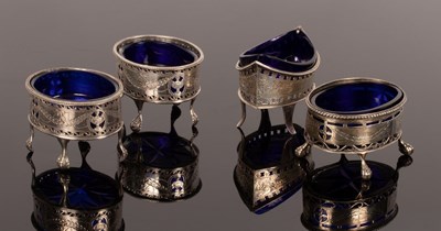 Lot 31 - A pair of George III oval silver salts, HB,...