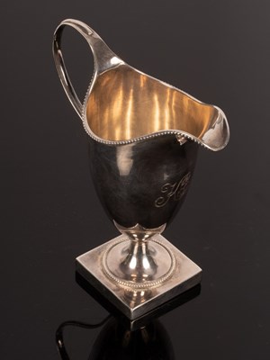 Lot 63 - A George III silver jug, Hester Bateman,...