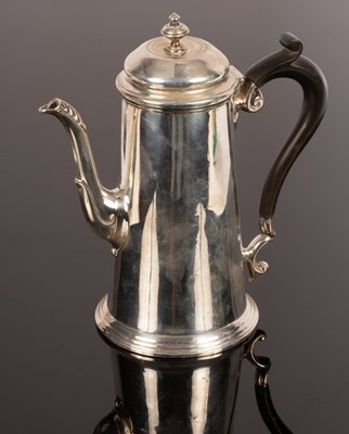 Lot 88 - A Georgian style silver coffee pot, M & Co.,...