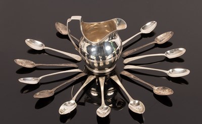 Lot 89 - A George III silver cream jug, London 1801 and...