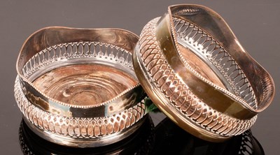 Lot 127 - A pair of silver plated wine coasters with...