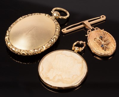 Lot 164 - A 9ct gold oval locket with gem set floral...