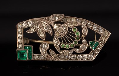 Lot 191 - A green and white paste set brooch of Art Deco...