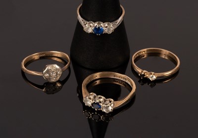 Lot 195 - A sapphire and diamond crossover ring set in...