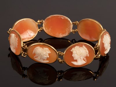 Lot 203 - An Italian shell cameo mounted bracelet, the...