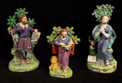 Lot 396 - Three pearlware figures of saints, Paul, Mark...