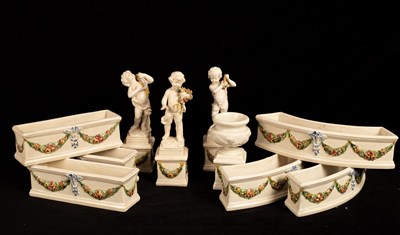 Lot 400 - A pottery table centre piece, comprising three...