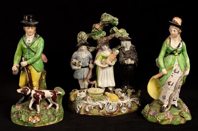 Lot 403 - A Staffordshire pearlware group 'The Tithe Pig'...