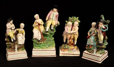 Lot 406 - Four pearlware figure groups of rural folk on...